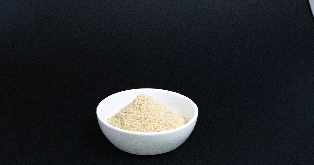 Bowl of freeze dried Feiolix feijoa fruit powder